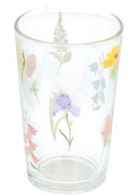 A glass with flowers on it

AI-generated content may be incorrect.